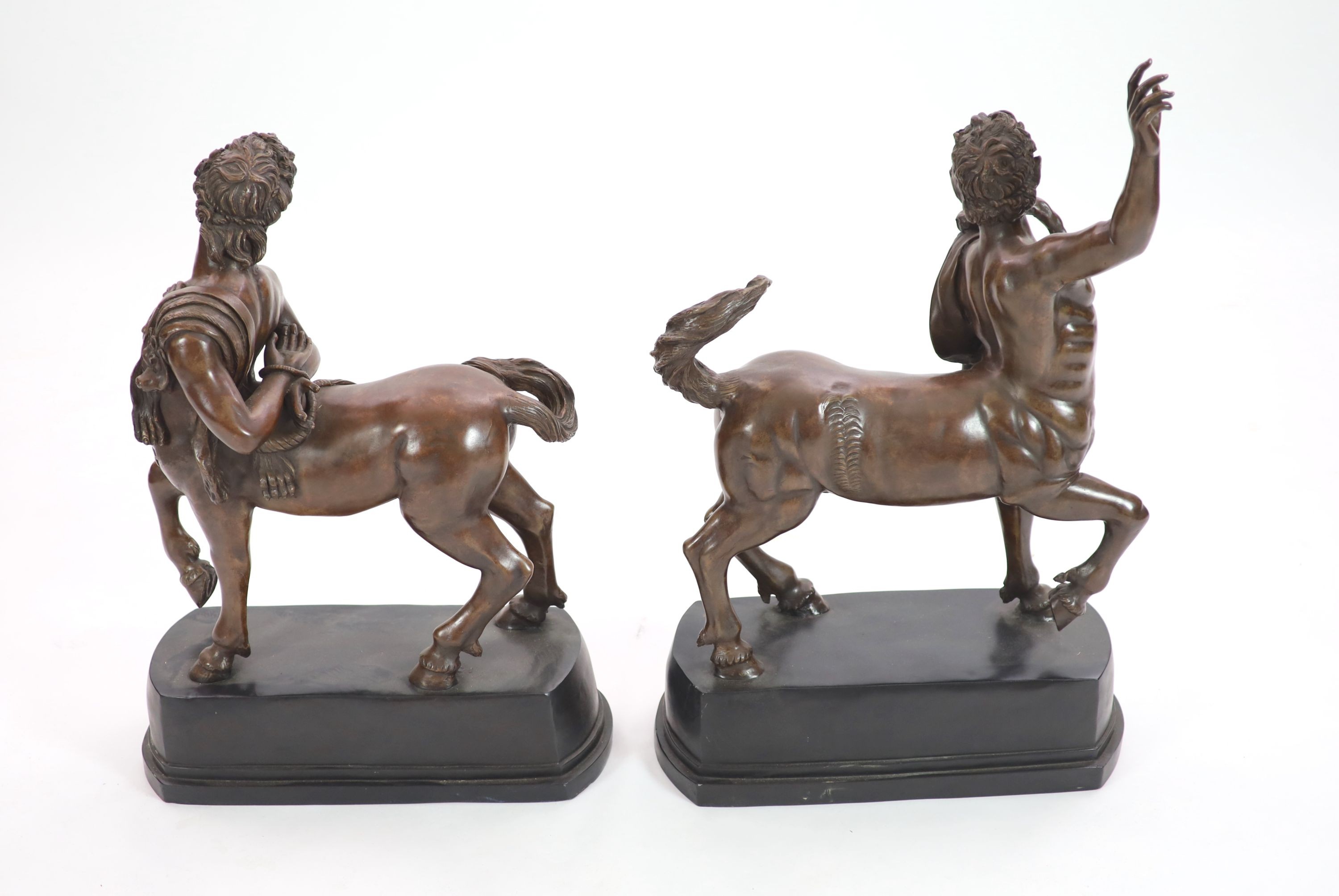 A pair of large faux bronze figures of centaurs, ex. Castlehyde House estate, Michael Flatley Largest H 91cm. L 56cm.